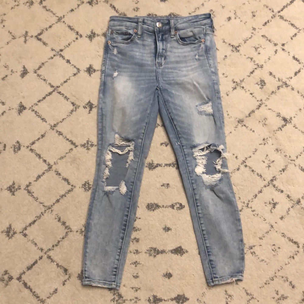 NWT skinny high waisted distressed jean.